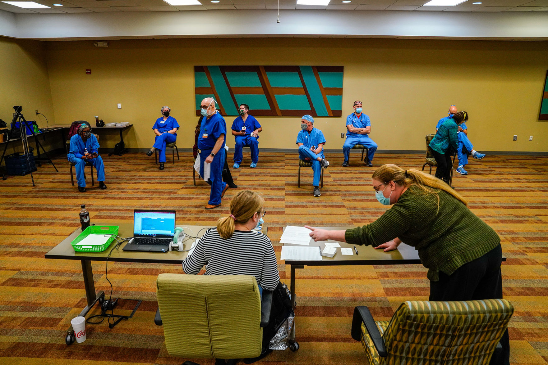 Front-line workers at Tanner Health System receive first doses of coronavirus vaccines
